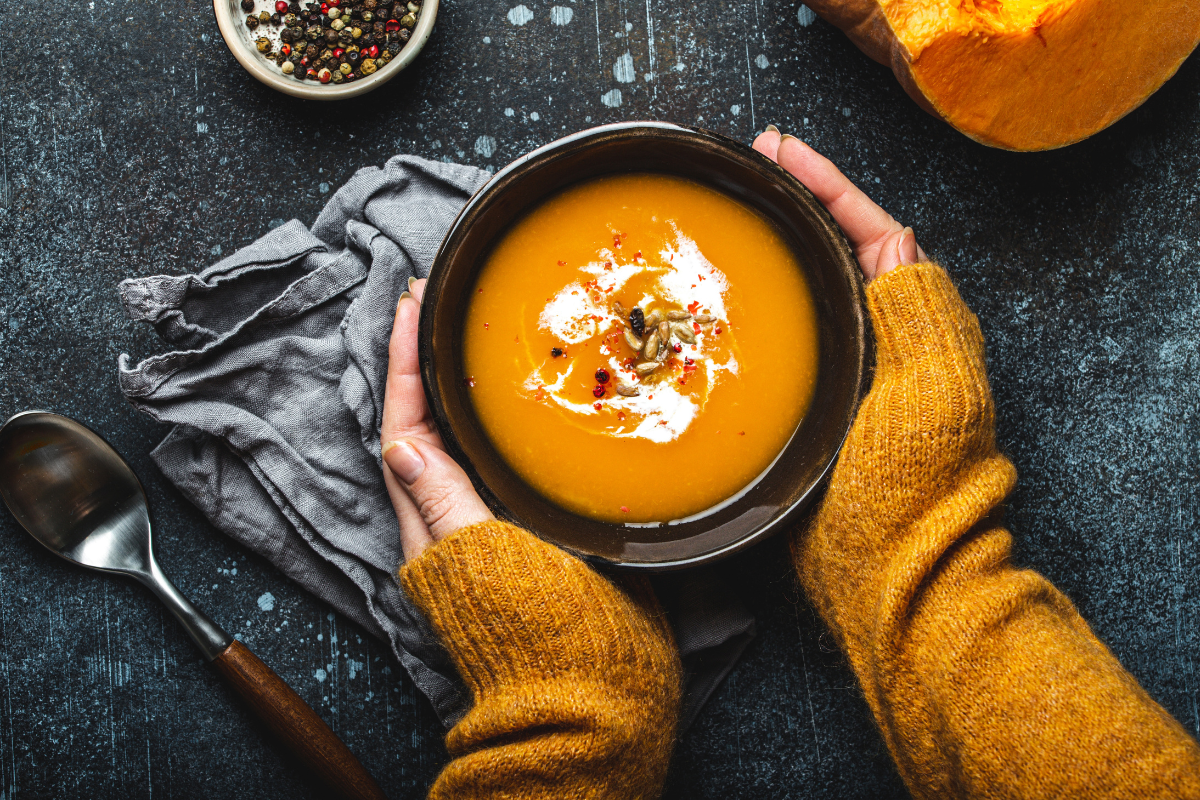 butternut squash soup with pumpkin seeds and bread