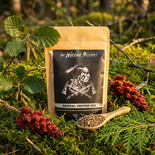Boreal Pepper Mix pouch staged in boreal forest moss with staghorn sumac, alnus crispa, and thuja foliage