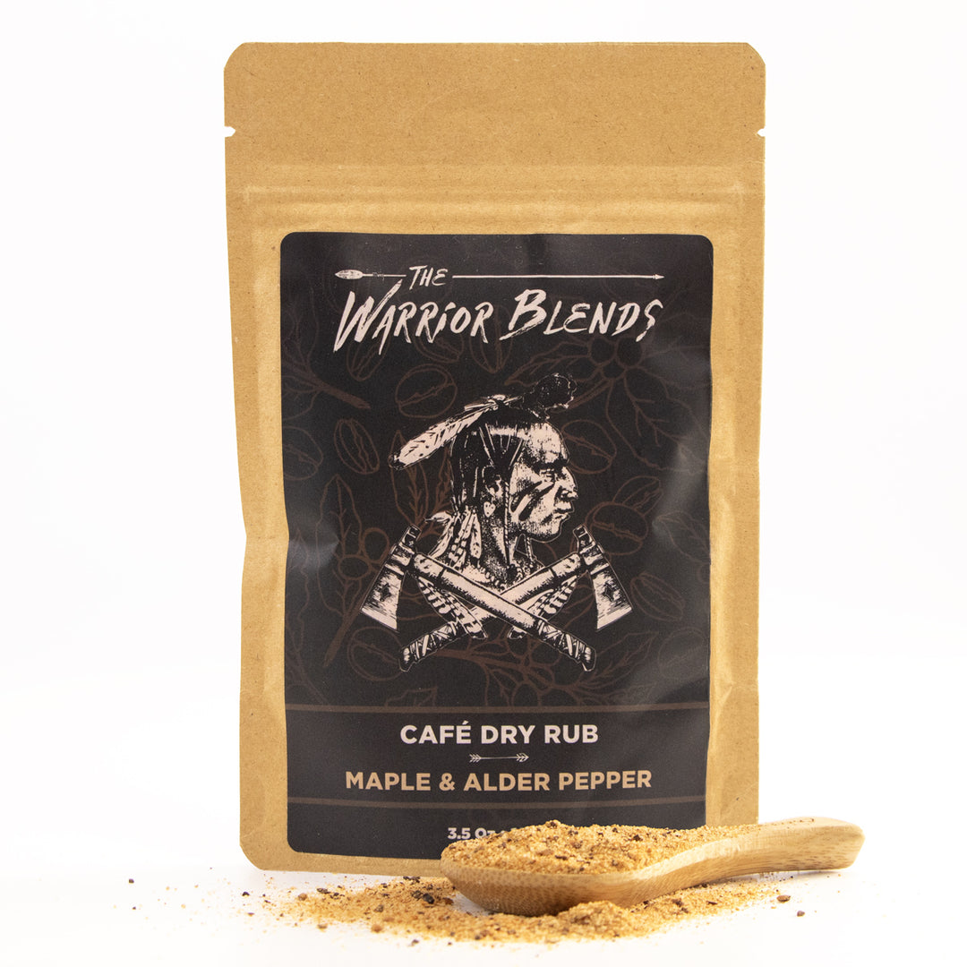 Café Dry Rub Maple & Alder Pepper seasoning pouch with wooden spoon on white background