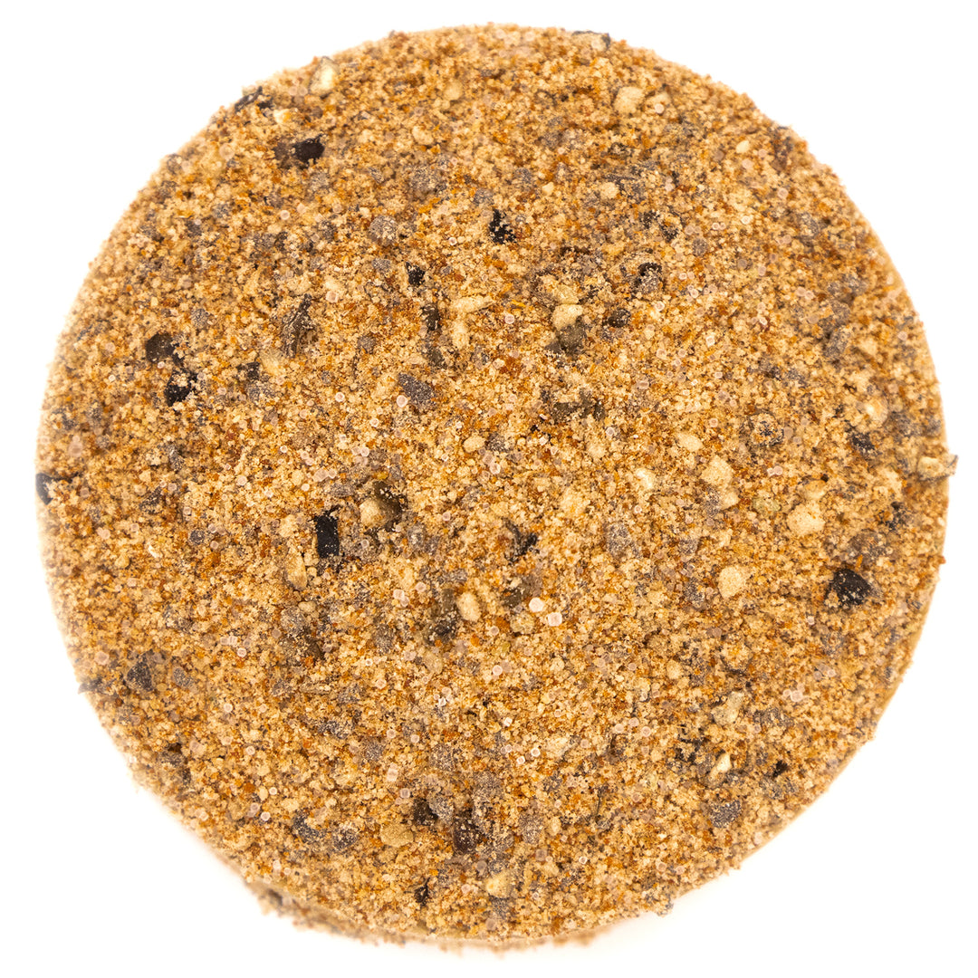 Close-up texture of Café Dry Rub Maple & Alder Pepper seasoning blend