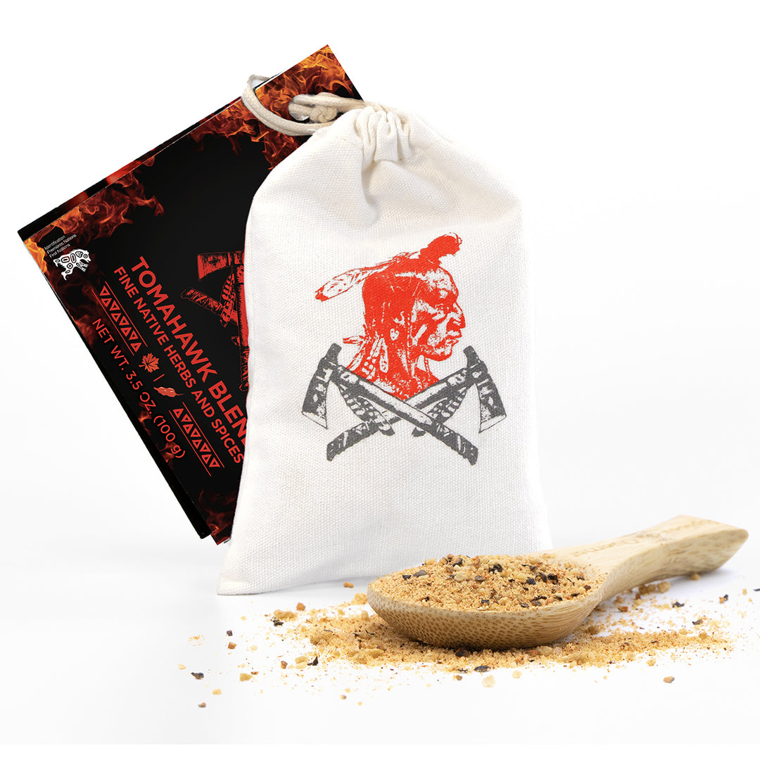 Tomahawk Blend seasoning pouch with canvas bag and wooden spoon on white background