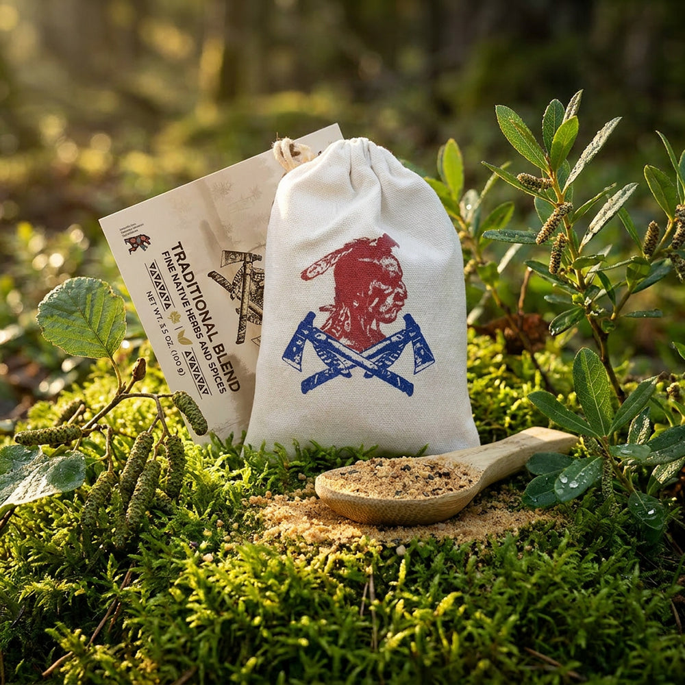 Traditional Blend seasoning pouch staged in boreal moss with alnus crispa and sweet gale at golden hour
