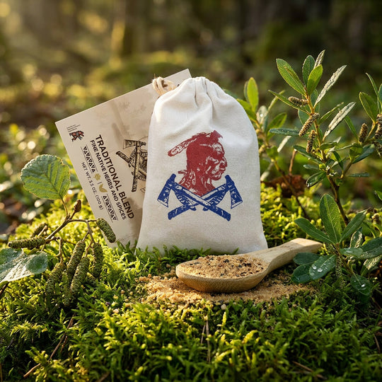 Traditional Blend seasoning pouch staged in boreal moss with alnus crispa and sweet gale at golden hour