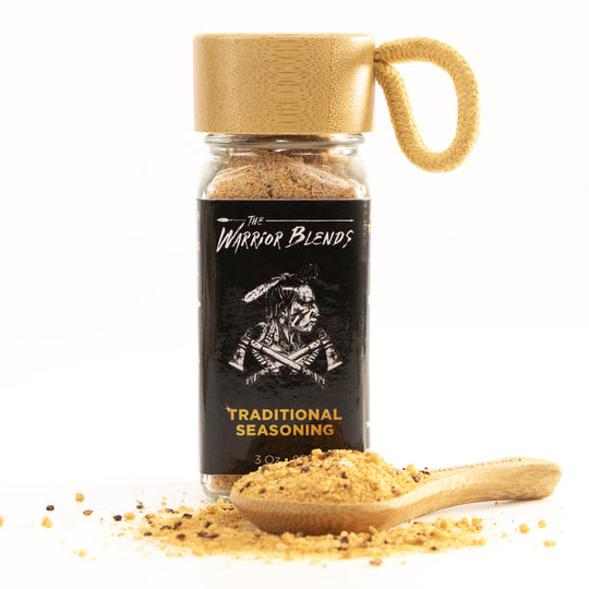 Traditional Blend seasoning jar with bamboo cap and wooden spoon on white background