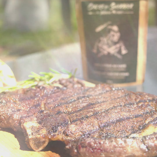 Video demonstration of Café Dry Rub seasoning rubbed onto steak, grilled over high heat, sliced, and served